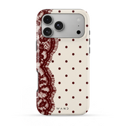 Love Letter iPhone case with burgundy lace and polka dots on cream, back view