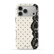 Poise iPhone case with black lace and polka dots on cream, back view