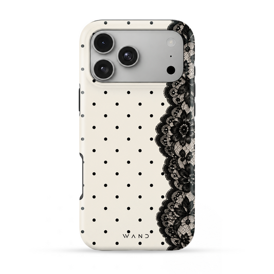 Poise iPhone case with black lace and polka dots on cream, back view